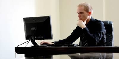 Businessman at desk with computer