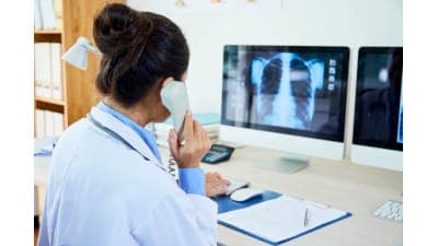 female radiologist on the phone
