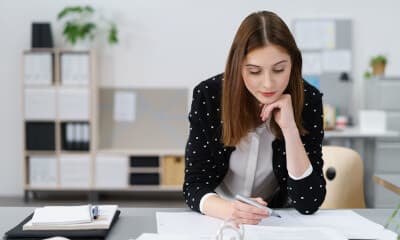 woman studying a report